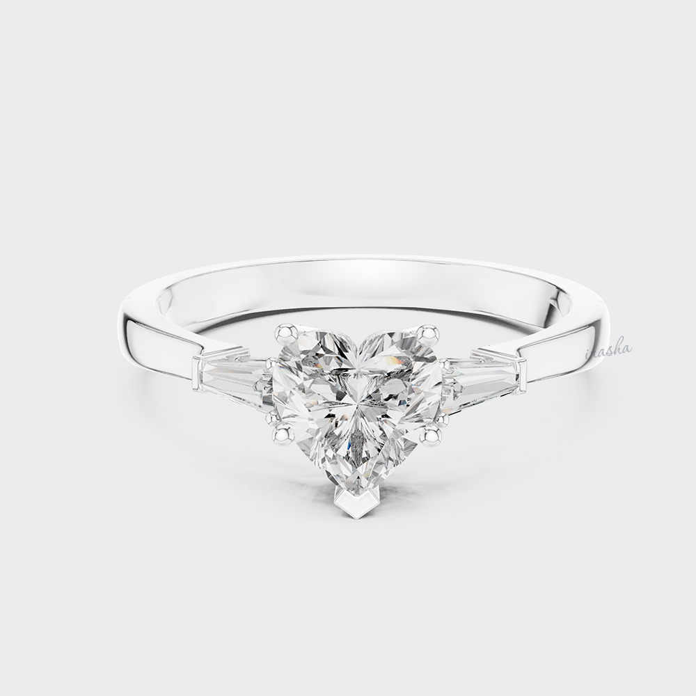Diamond ring with a heart-shaped center stone in Platinum