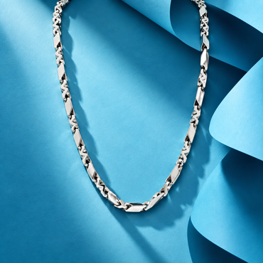 Studio lifestyle shot of a geometric interlocking platinum chain for men in genuine 950 platinum