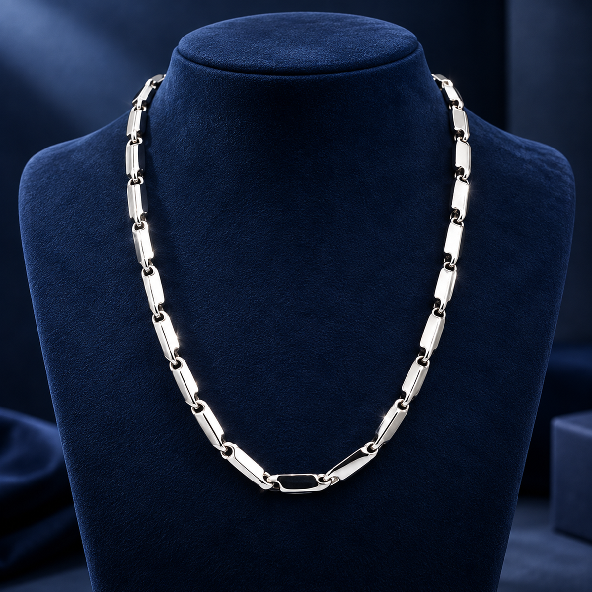 Men's platinum chain models showcasing structured bar and circular loop link patterns