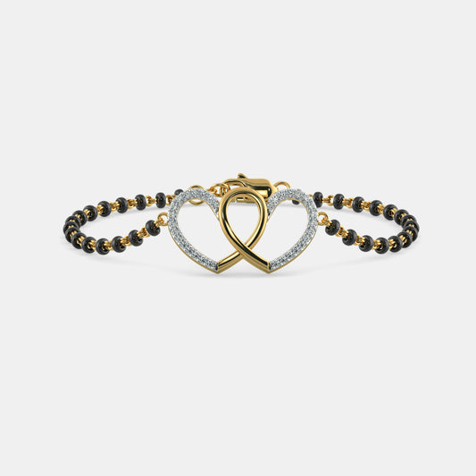 Classic yellow gold Mangalsutra bracelet featuring a round lab diamond