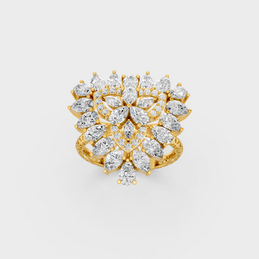 Side profile view of a Pear Marquise Round Cut Statement Ring resting on an 18K Yellow Gold Band.