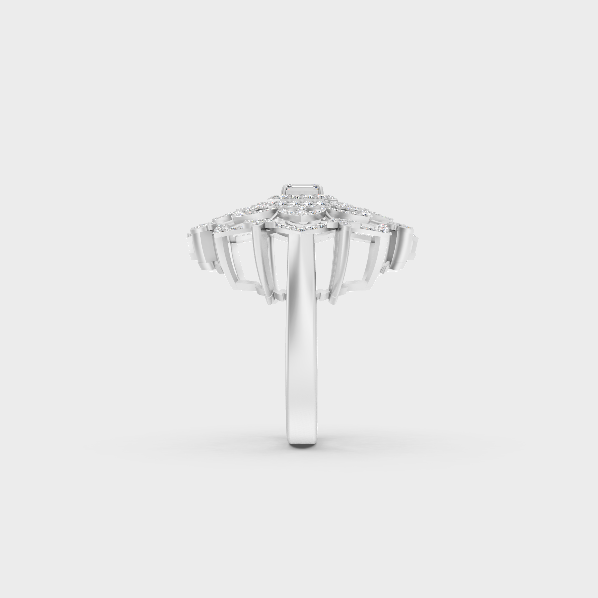 Exquisite prong details securing the Emerald and Round Cut Lab Diamonds on a polished 950 Platinum Band.