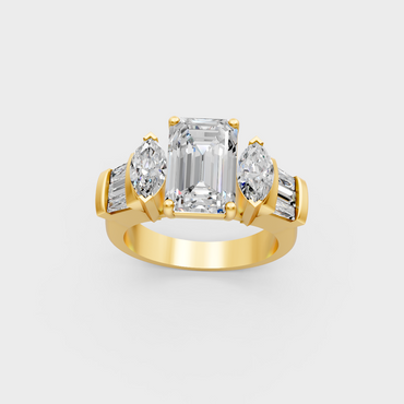 Close up detail of emerald baguette and marquise cut lab diamonds on yellow gold band