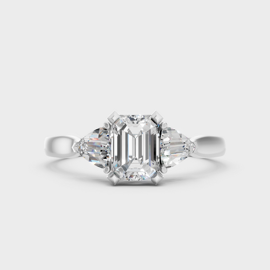 Sleek White Gold Three-Stone Ring Featuring A Igi Certified Emerald-Cut Diamond