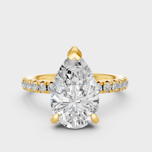 Luxury Pear Halo Diamond Ring In Yellow Gold With Round Accent Sparkle