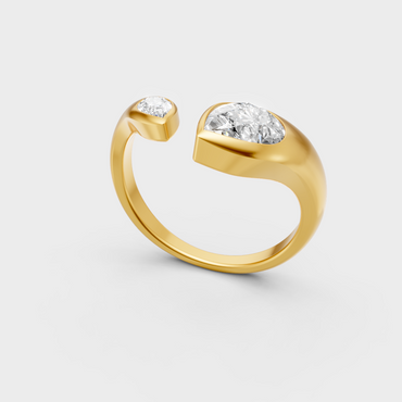 Classic yellow gold engagement ring featuring a 1.06ct pear-shaped lab diamond