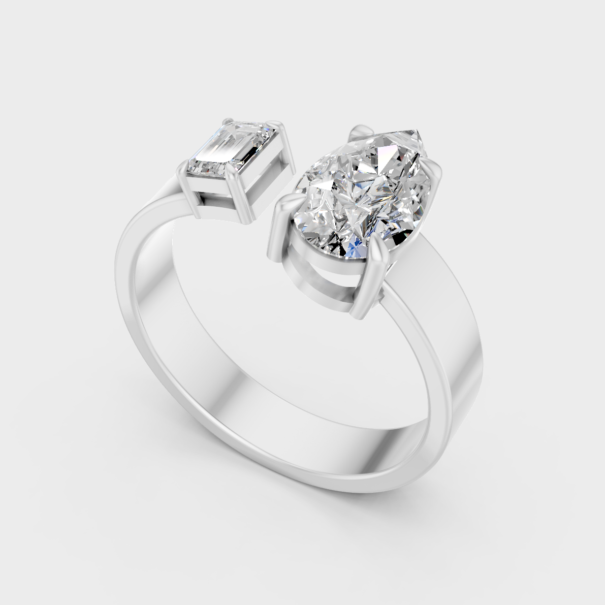 Platinum Engagement Ring With Emerald And Pear Diamonds