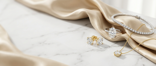 Global trends in lab-grown diamond engagement rings, stud earrings, tennis bracelet, and pendant on champagne silk for Inasha Diamonds blog header.