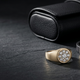 Luxury men's diamond ring, bracelet and pendant displayed on black marble in a premium editorial jewelry composition.