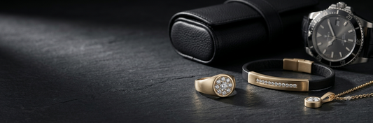 Luxury men's diamond ring, bracelet and pendant displayed on black marble in a premium editorial jewelry composition.