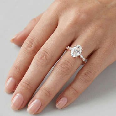 Rose Gold Ring Featuring A Igi Certified Oval-Cut And Marquise Side 