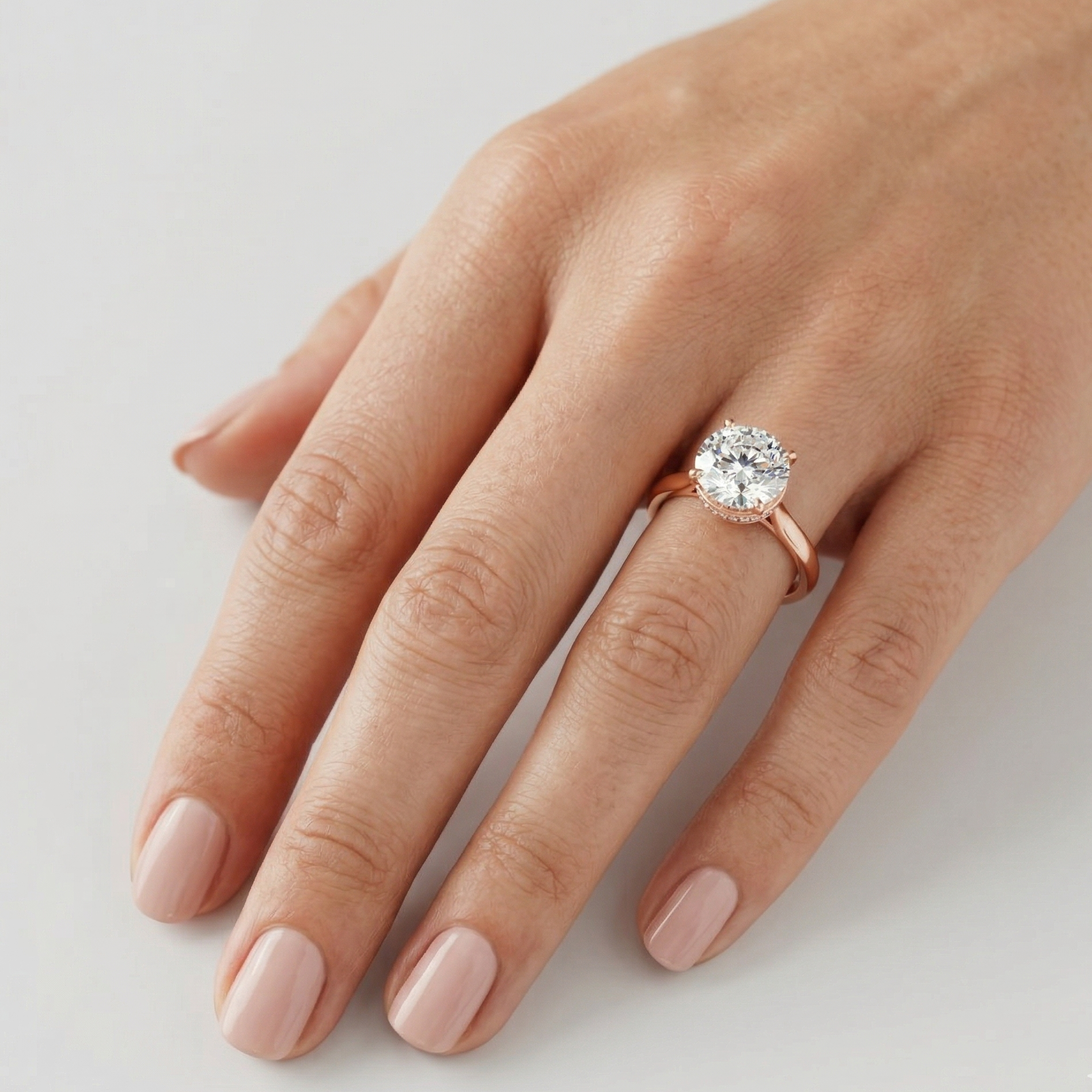 Round-Cut Lab-Grown Diamond Hidden Halo Ring in Rose Gold