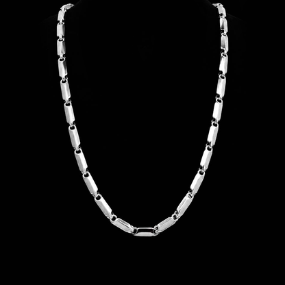 Close-up view of a block link platinum chain necklace for men in genuine 950 platinum