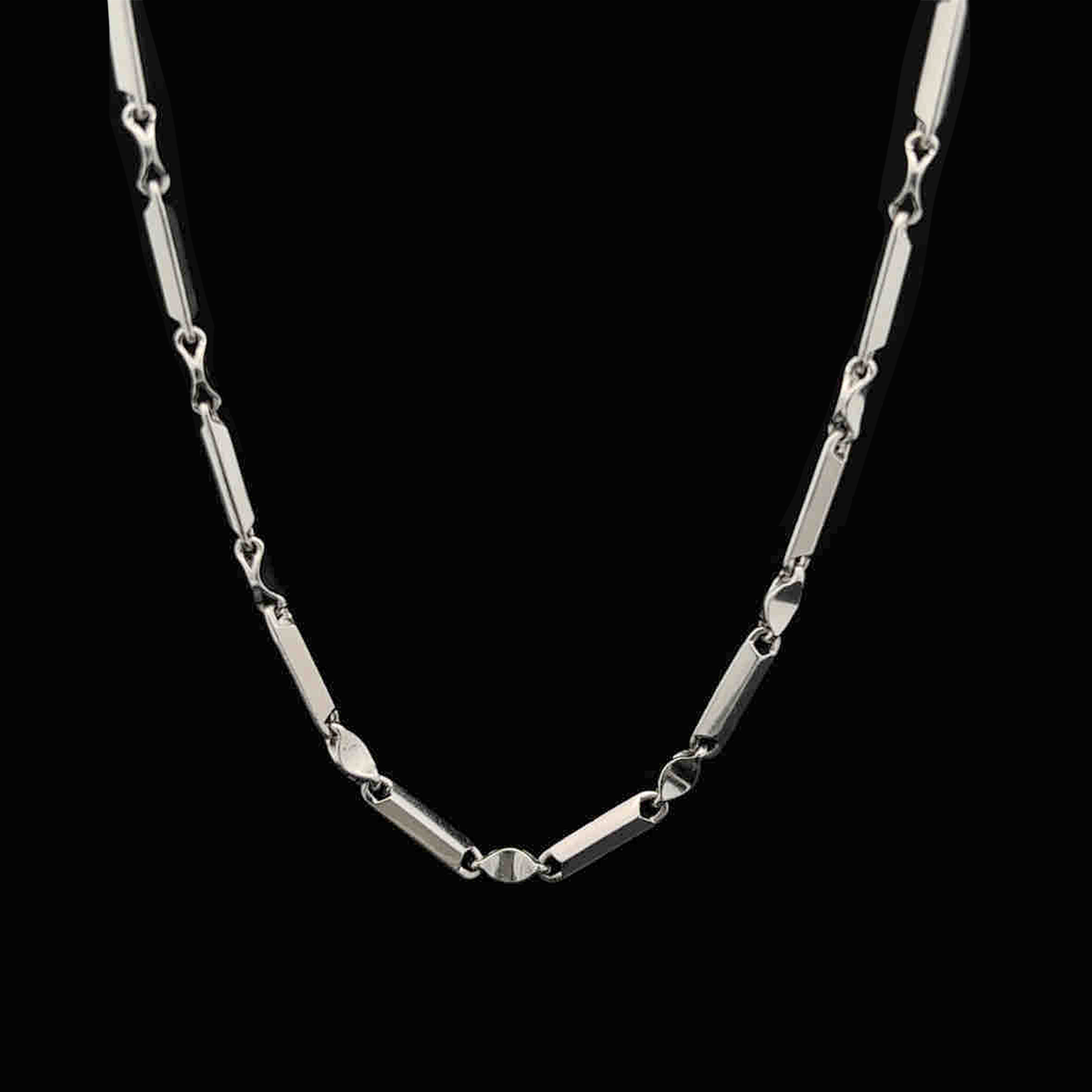 Men’s platinum chain models showcasing geometric bar links and sculpted connectors