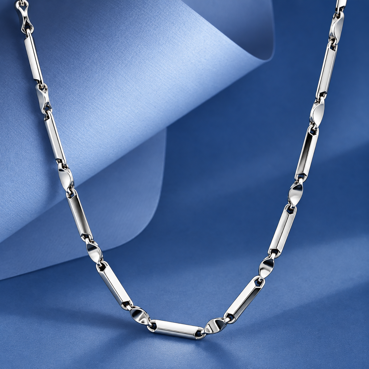 Close-up view of a bar link platinum chain for men crafted in genuine 950 platinum