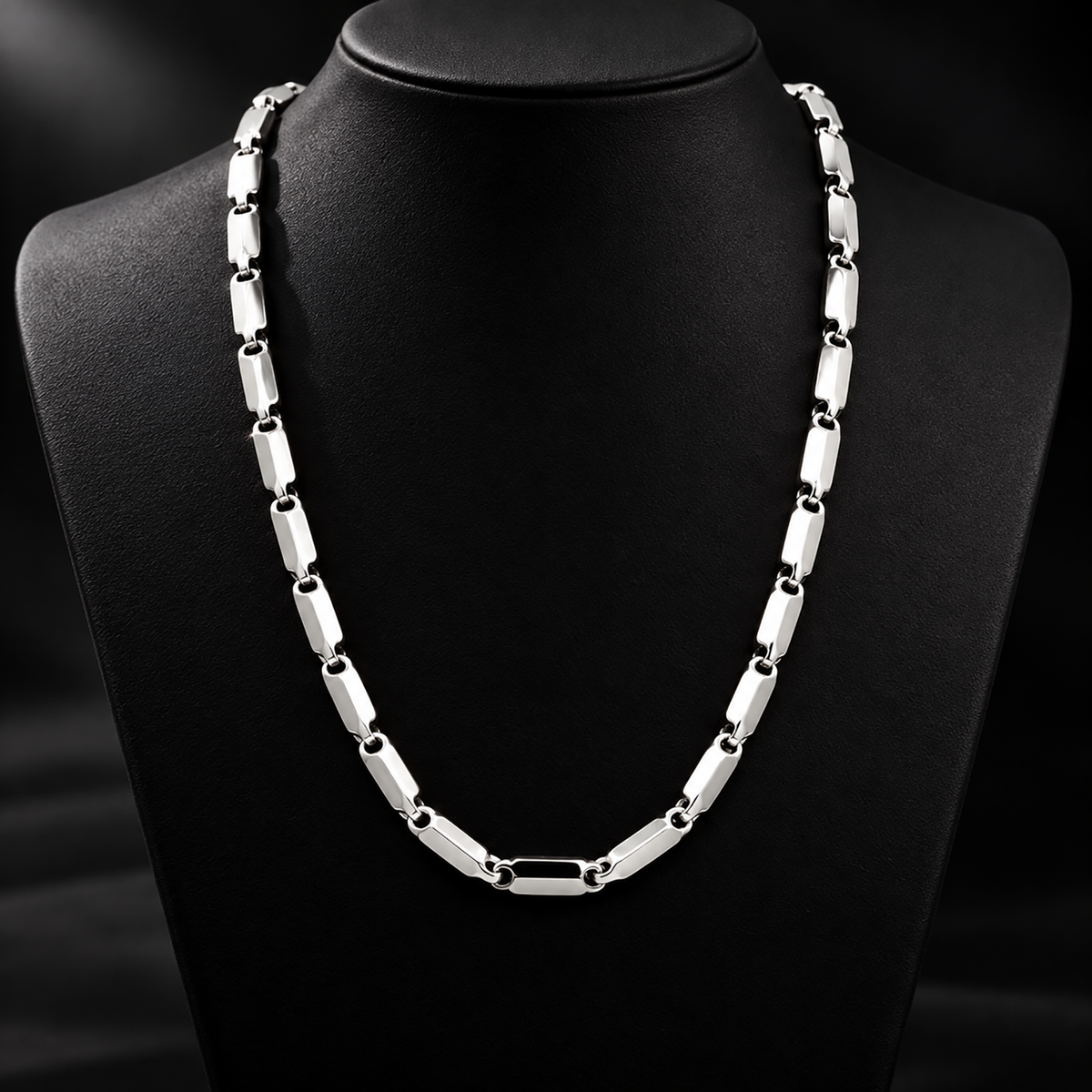 Men’s platinum chain models showcasing structured block segments and circular loop joints