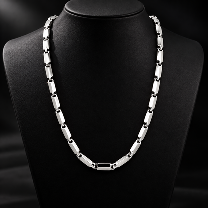 Men’s platinum chain models showcasing structured block segments and circular loop joints