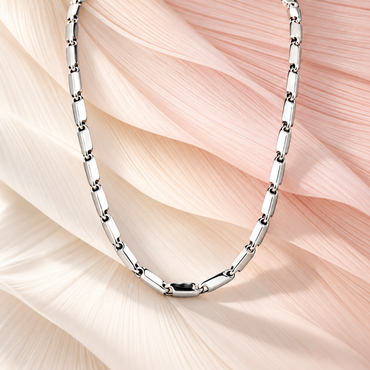 Studio lifestyle shot of a bar and link platinum chain for men in genuine 950 platinum