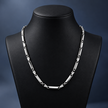 Men’s platinum chain necklace featuring polished rectangular links on a display mannequin