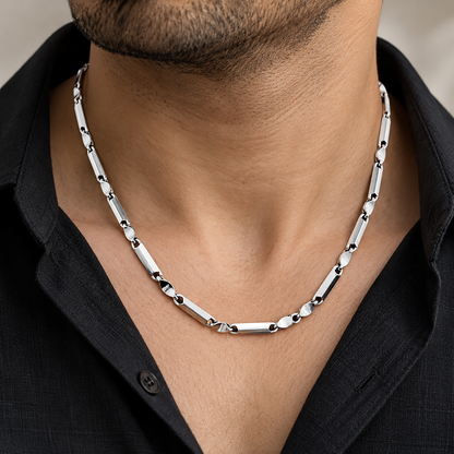 Men’s platinum chain displayed on a black bust showcasing the 950 platinum bar link design