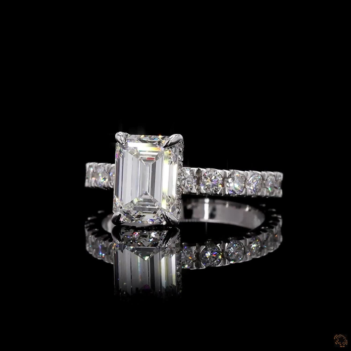 White gold lab grown diamond halo ring emerald and round cut