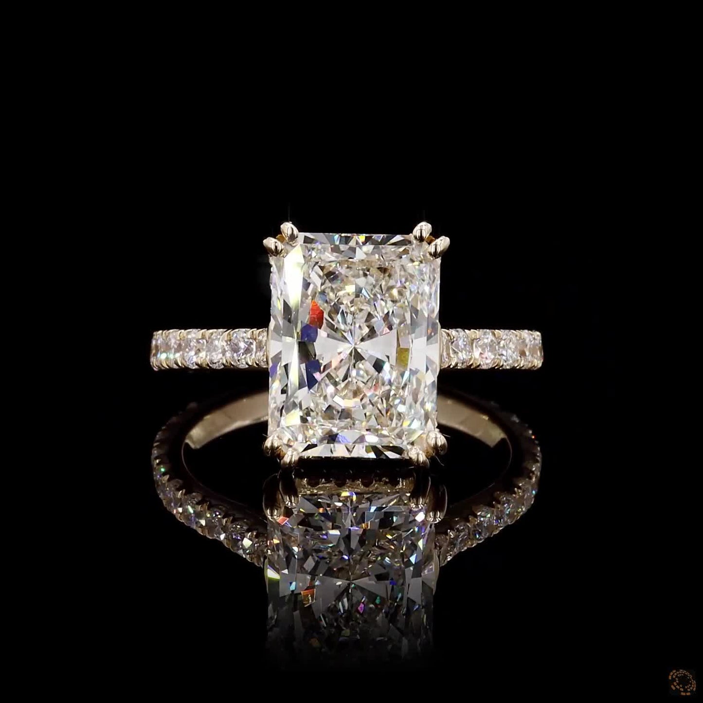 radiant and round cut lab grown diamond ring yellow gold