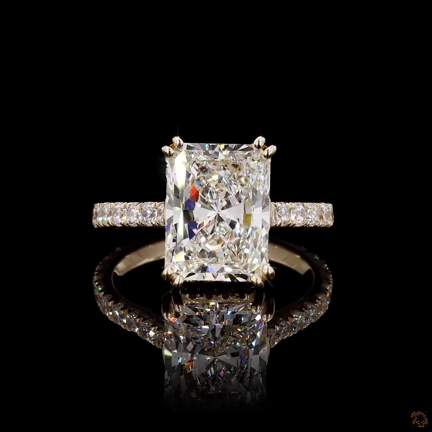 radiant and round cut lab grown diamond ring yellow gold