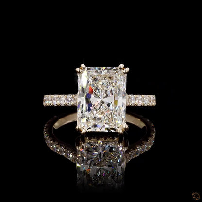 radiant and round cut lab grown diamond ring yellow gold