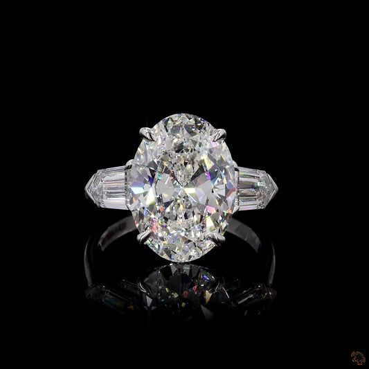 White gold lab grown diamond three stone ring oval bullet cut