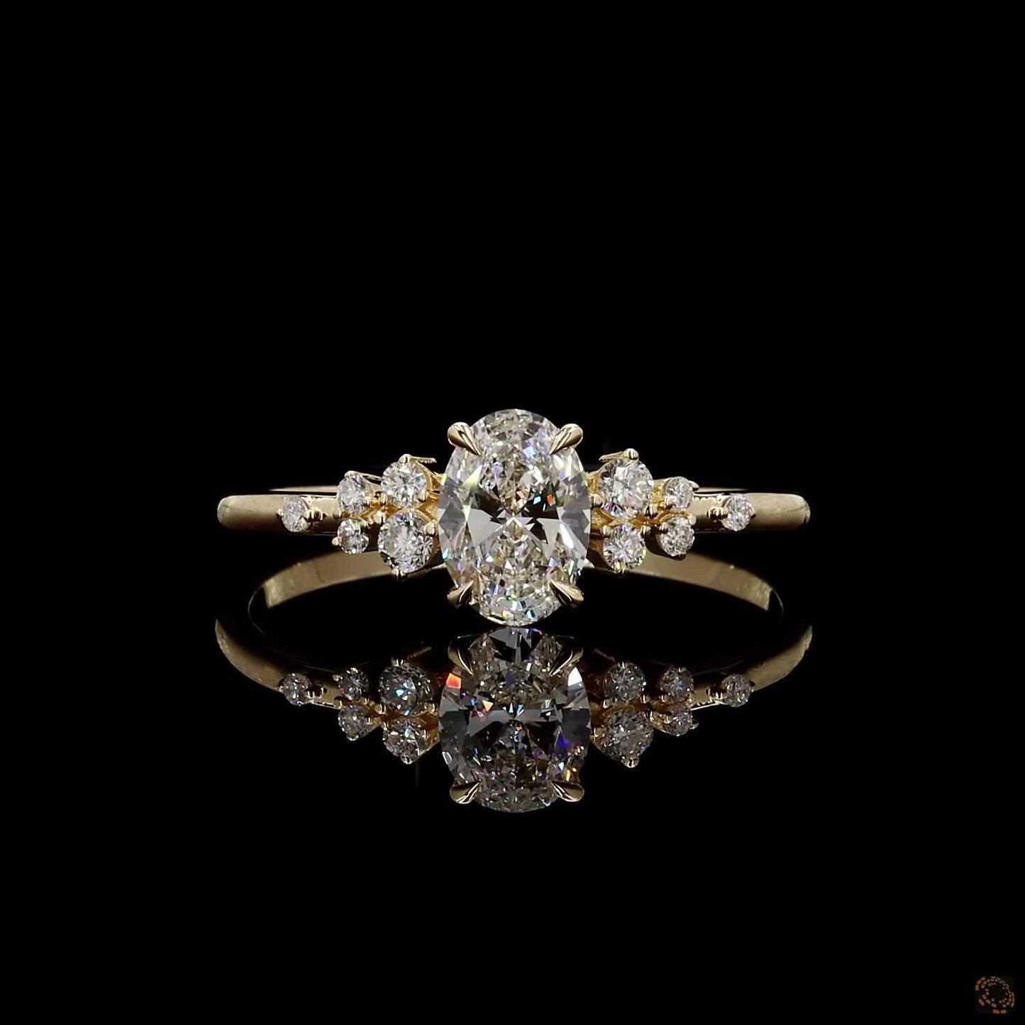 oval and round cut lab grown diamond ring yellow gold