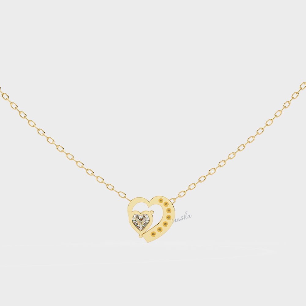 Gold heart-shaped necklace with a diamond 