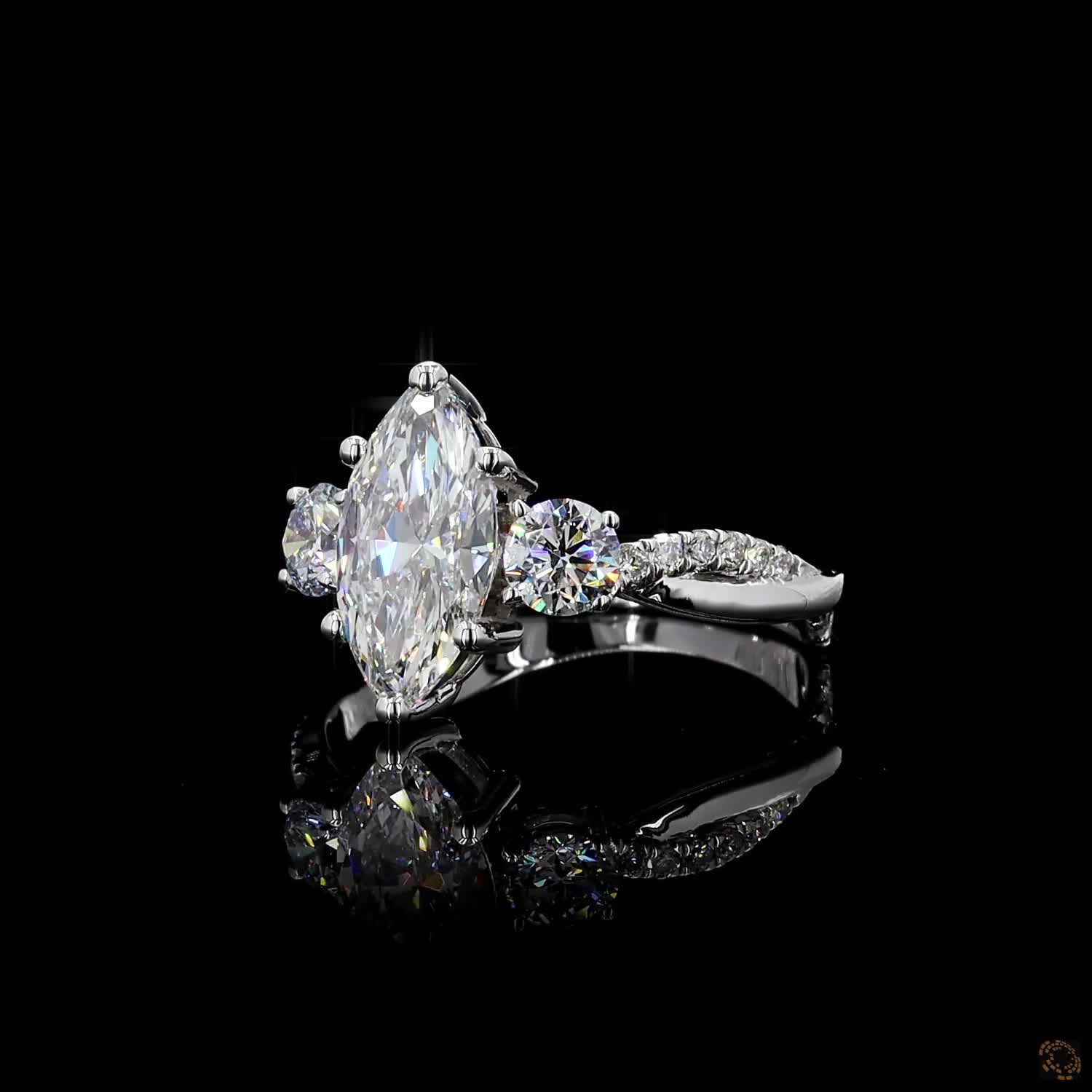 hallmark white gold marquise round diamond twist ring