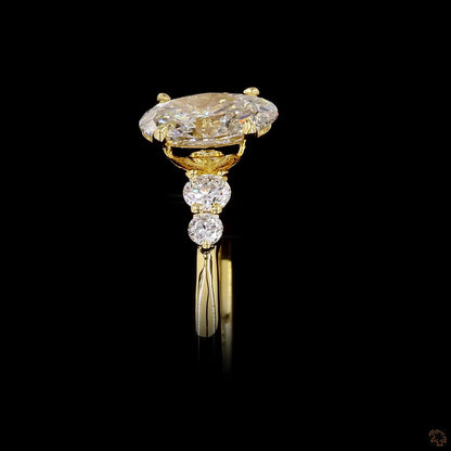 Oval and round cut lab grown diamond ring yellow gold