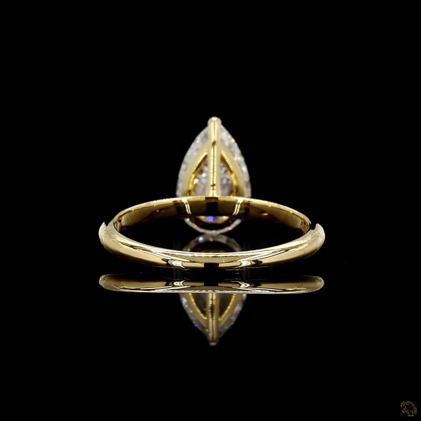 Elegant yellow gold lab grown pear diamond ring