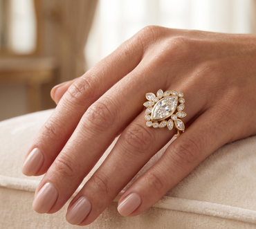  9k Yellow Gold Engagement Ring Featuring A  Marquise Diamond With Accents