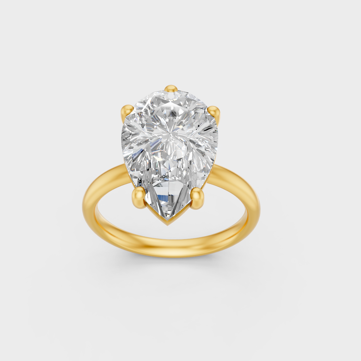 Majestic 5 Carat Pear-Cut Lab-Grown Diamond Solitaire in a polished 14K Yellow Gold setting.
