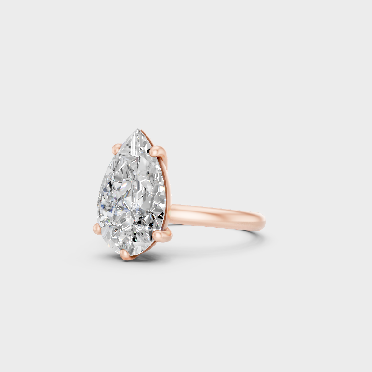 Distinctive 5 Ct Pear-Cut Lab-Grown Diamond Engagement Ring in 18K Rose Gold.