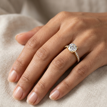 Shop 1.27 Ct Round Cut Lab-Grown Diamond Solitaire Ring With Accents in 9K, 14K, 18K Yellow, White, Rose Gold or 950 Platinum. IGI / GLI Certified ethical luxury fine jewelry.