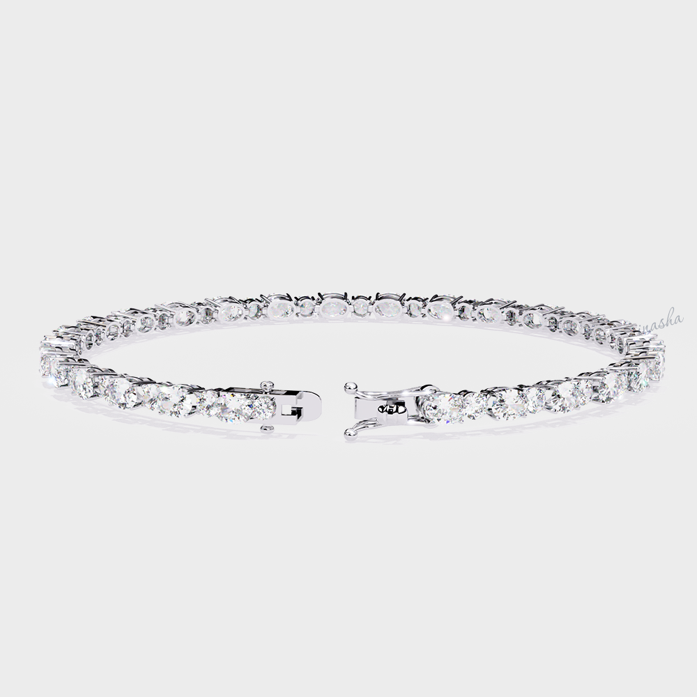Certified GLI oval and round cut lab grown diamond tennis bracelet in white gold and platinum