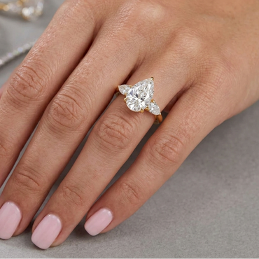 Pear Diamond Three Stone Ring In 14K Yellow Gold
