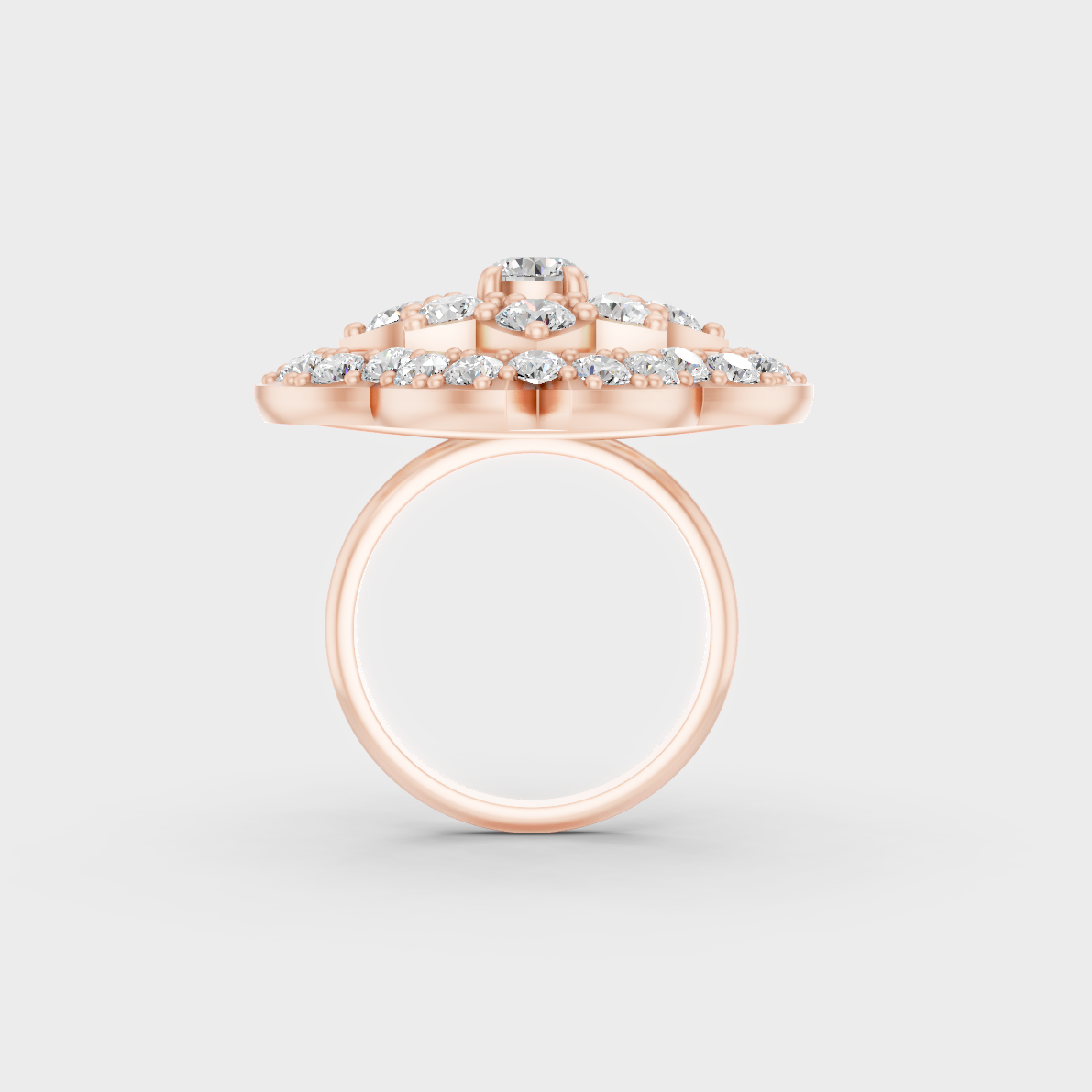 A Sustainable Lab-Created Diamond Statement Ring catching the light on a warm 18K Rose Gold Band.