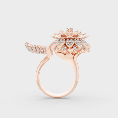 Top-down studio shot displaying the immense Brilliant Sparkle of a 2.41ct Round and Pear Diamond Ring in 9K Rose Gold.