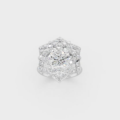 Front view of an Ethical Luxury Statement Ring with a Round Brilliant Diamond secured in 14K White Gold.