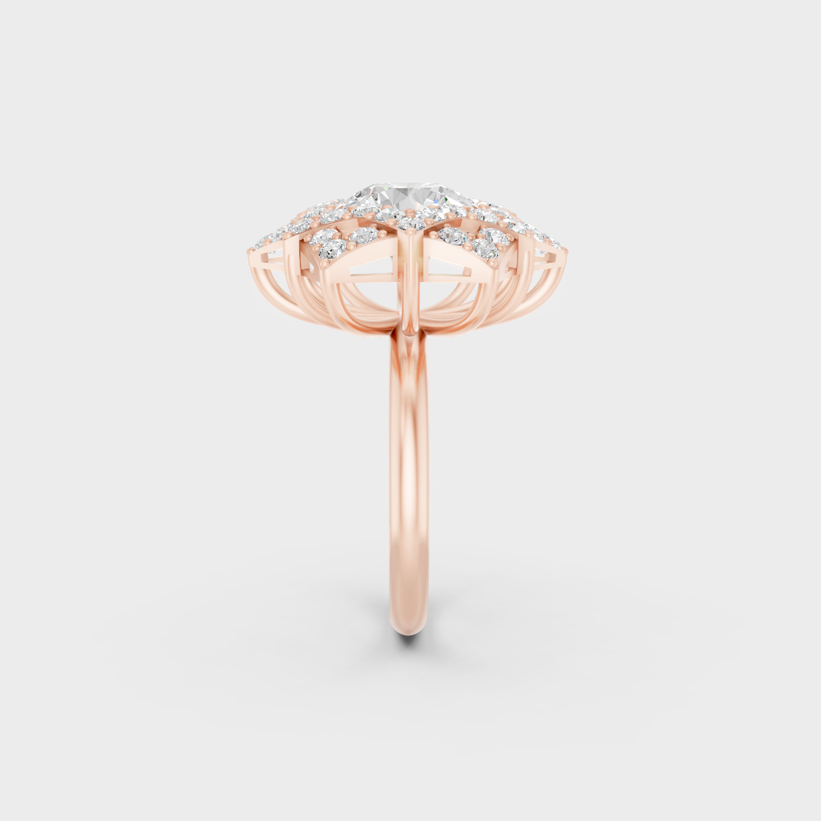 A Sustainable Lab-Created Diamond Statement Ring catching the light on a warm 18K Rose Gold Band.
