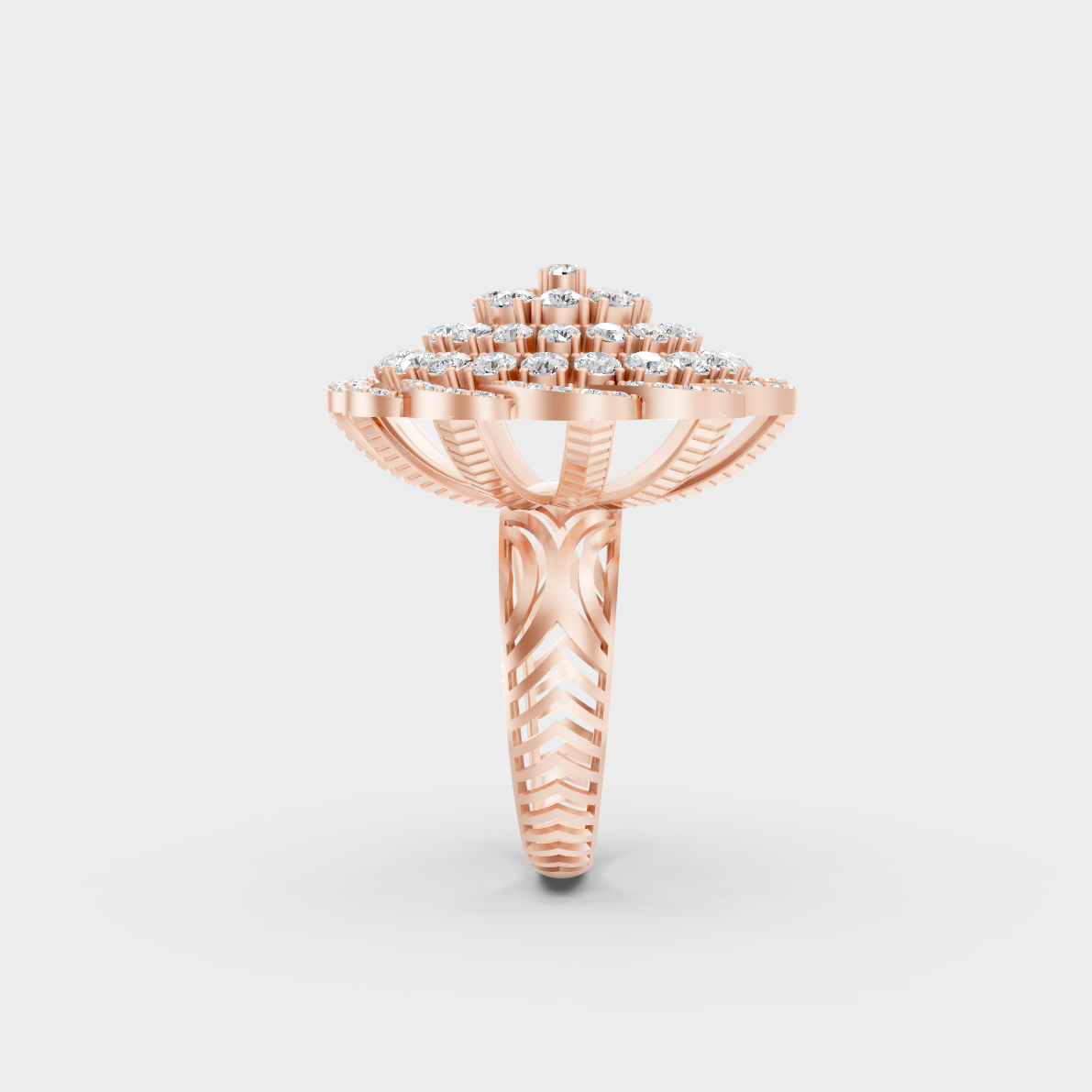 A Sustainable Lab-Created Diamond Statement Ring catching the light on a warm 18K Rose Gold Band.