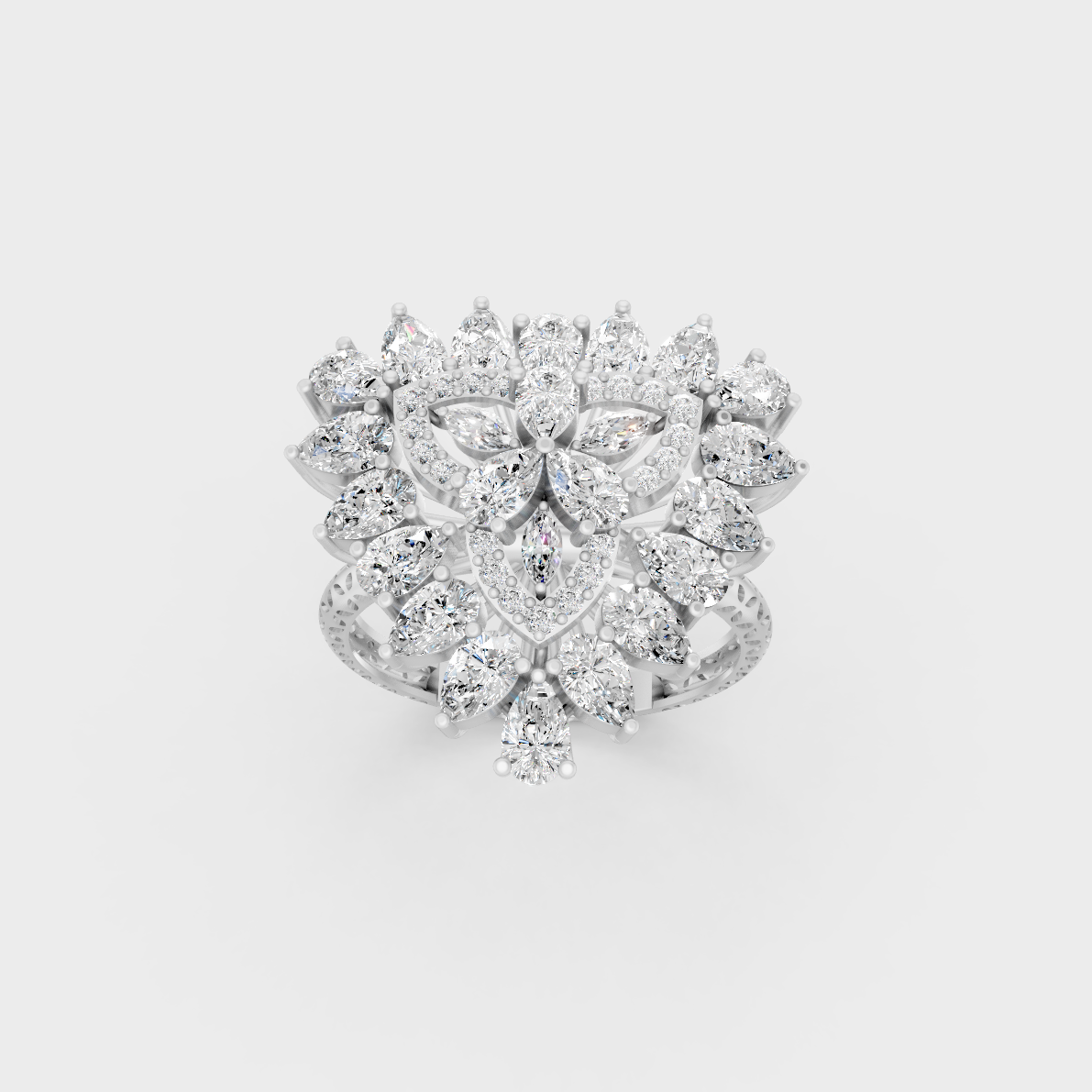 Front view of an Ethical Luxury Statement Ring with Pear, Marquise, and Round Brilliant Diamonds secured in 14K White Gold.