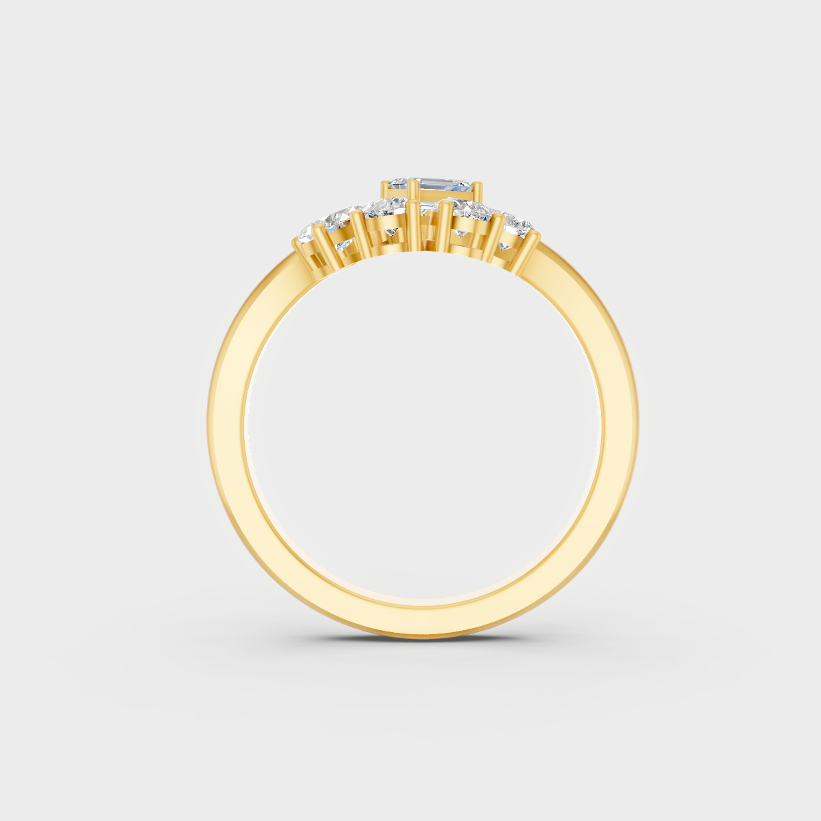 Top-down macro photo of an Ethical Luxury Mixed Shape Diamond Ring cast in classic 18K Yellow Gold.