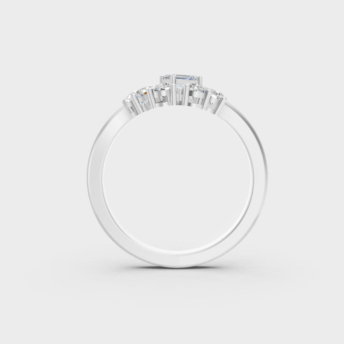 Exquisite prong details securing the Pear Emerald Round Cut Lab Diamonds on a polished 950 Platinum Band.