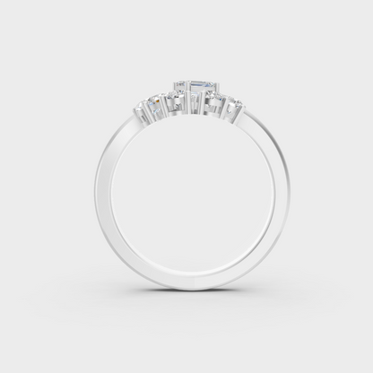 Exquisite prong details securing the Pear Emerald Round Cut Lab Diamonds on a polished 950 Platinum Band.