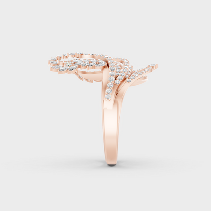 A Sustainable Lab-Created Diamond Statement Ring catching the light on a warm 18K Rose Gold Band.